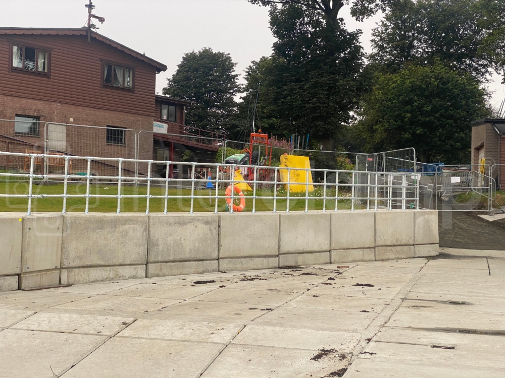 Interclamp galvanised three rail barrier used to protect slipway users at a busy yacht club